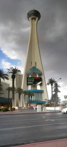 storm clouds make the stratosphere tower look coo