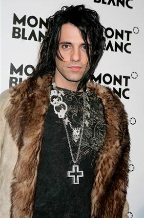 criss angel looking pimp in his fur coat 