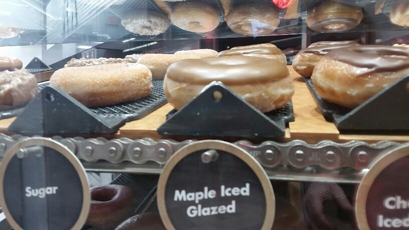 This Krispy Kreme is one that Actually makes the donuts not just one that sells them. You can watch the process through a window.