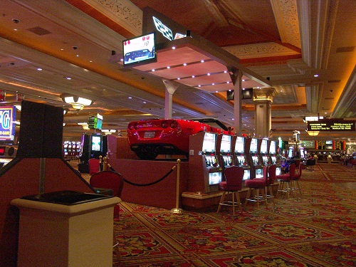 red corvette on top of slot machines