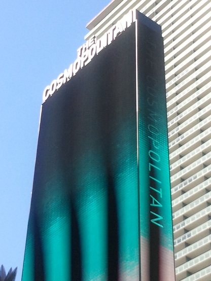 view of the cosmopolitan las vegas sign from street level